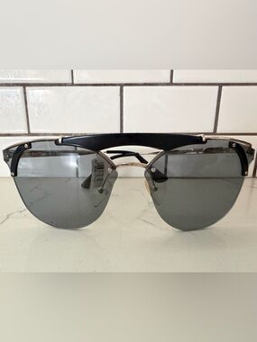 Prada Men's Black and Gold Rimless Shield Sunglasses